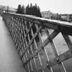Detail of latticed steel railings of bridge