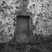 Detail of doorway showing datestone of 1626 and lintel of 1737.