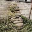 Detail of base of pier incorporated into W buttress on S side of dutch barn in Kirkstyle steading.