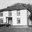 General view of farmhouse from SE.