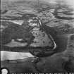 RAF WWII oblique aerial photograph of Langholm Barracks taken from the NW.  Langholm town is visible in the background.