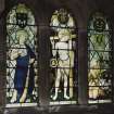 Interior. S wall detail ofR J Jardine memorial  stained glass windows by Ninian Comper c.1920