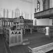 Interior.
View of platform from E showing elder's pews, communion table and pulpit.