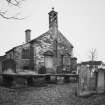 General view from W, showing gable and bellcote.