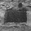 Detail of inscribed stone on NE elevation.
