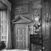 Interior, 1st. floor, ante-room, view of door with carved wooden panel above, leading to 'Bonnie Prince Charlie's' bedroom.