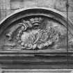 Courtyard, detail of pediment above window