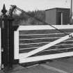 Detail of level crossing gate, post and hinge.