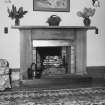 Interior.
Ground floor, sitting room, view of fireplace.