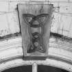 Interior.
Dairy, entrance hall, detail of carved keystone above fanlight.