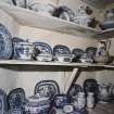 Interior, detail of lower ground floor china cupboard blue and white china