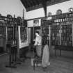 Interior, view of studio from North West showing bookcases and manequin representing Hornel at work