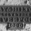 Detail of Kay and Hilton's manufacturer's nameplate on millstone.
