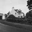 General view of farmhouse from S