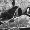 Detail of threshing barn waterwheel and lade.