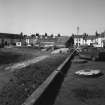 General view of Main street, McWilliams Store and Parish Church from SSE.