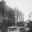 General view of priory and grave yard.