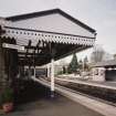 Detailed view from NE of awning attached to station offices on S-bound platform