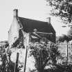 Rear elevation of house prior to restoration
