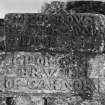 Carved stones built into North wall of church