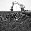 Kingside Hill: possible enclosed cremation cemetery
Field clearance piled on NT66NW 13 and the process of removing it.
