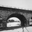 Detailed  view from SW of central part of viaduct, showing all-rubble (grey sandstone) construction