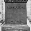 Inscription at base of statue