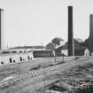 View from W showing the two Hoffman kilns and one Newcastle kiln, all three chimneys and part of the rail conection.