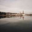 Distant general view of paper mill from S