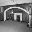 Gun room, fireplace situated under arched canopy, view from East North East