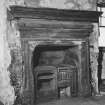 Interior - first floor, north apartment, detail of fireplace in north wall