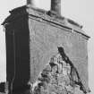 East gable chimney; view of moulded coping and finial base