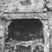 Bay House, 1 Panha'.
First floor, West gable wall; later fire-place contained within jambs of original opening