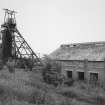 General view of surviving mine headstock, and winding engine house.
