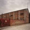 General view of South West corner of works, showing brick-clad erecting shop, with cast-iron uprights