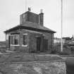 Kirkcaldy Harbour
View from north east of north and east sides of office overlooking railway swing bridge, dock gates and railway swing bridge between harbours