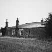 View from North of dwelling house attached to carriage house. 
Photosurvey 10 February 1994 at Kilrie Farm