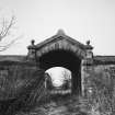 View from East of pend into court of carriage house and stable court.  
Photosurvey 10 February 1994 at Kilrie Farm