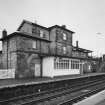 View across down platform to station buildings from SE.