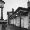 Detail.  Road level ticket office from N.