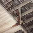 Detail of straw conveyor chain and guide pulleys, photographed 9 May 1994