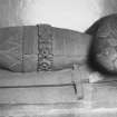 Recumbent effigy in the vestibule - mid-section with sword