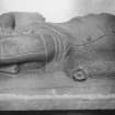 Recumbent effigy in the vestibule - head and arms