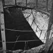 Cults Lime Works/Cults Hill Limestone Quarry.  View looking into top of stone built kiln showing brick lining to kiln.