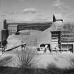 View from S of central section of lime works, which includes a hammer mill and conveying equipment