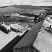 Elevated view from W (at middle level of shaft kilns) of E end of lime works, with vehicle stores in foreground, and associated brick works in background