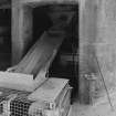 Detailed view of base of one of the shaft kilns, showing bottom of crushed lime storage hopper