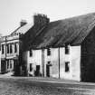 View from east of St Andrew House, Post Office and Saddlers