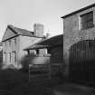 Edenwood Steading: View of dairy, byre, store, turnip house and cart shed from SW