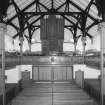 Interior. View from North showing the galleries and organ